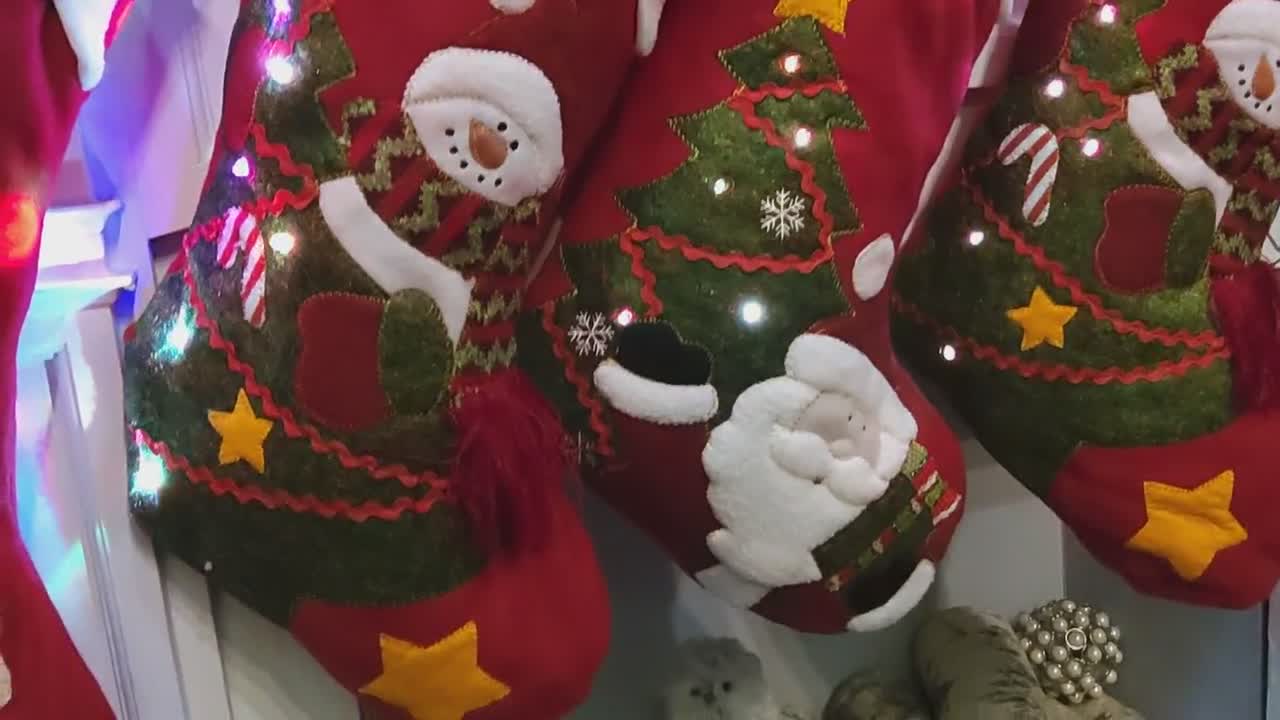 Confezione da 9 calze di natale a stivaletto rosso e bianco con Babbo Natale e pupazzo di neve 
