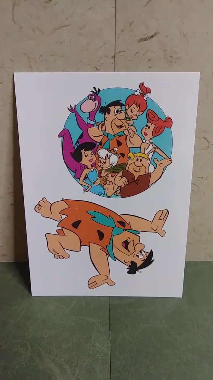 Anaglyph Fred Flintstone tattoo on the inner arm