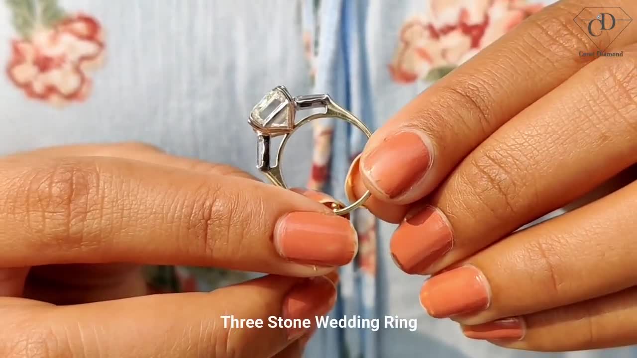 2.03 CT Emerald Cut Colorless Moissanite Bezel Set Three Stone