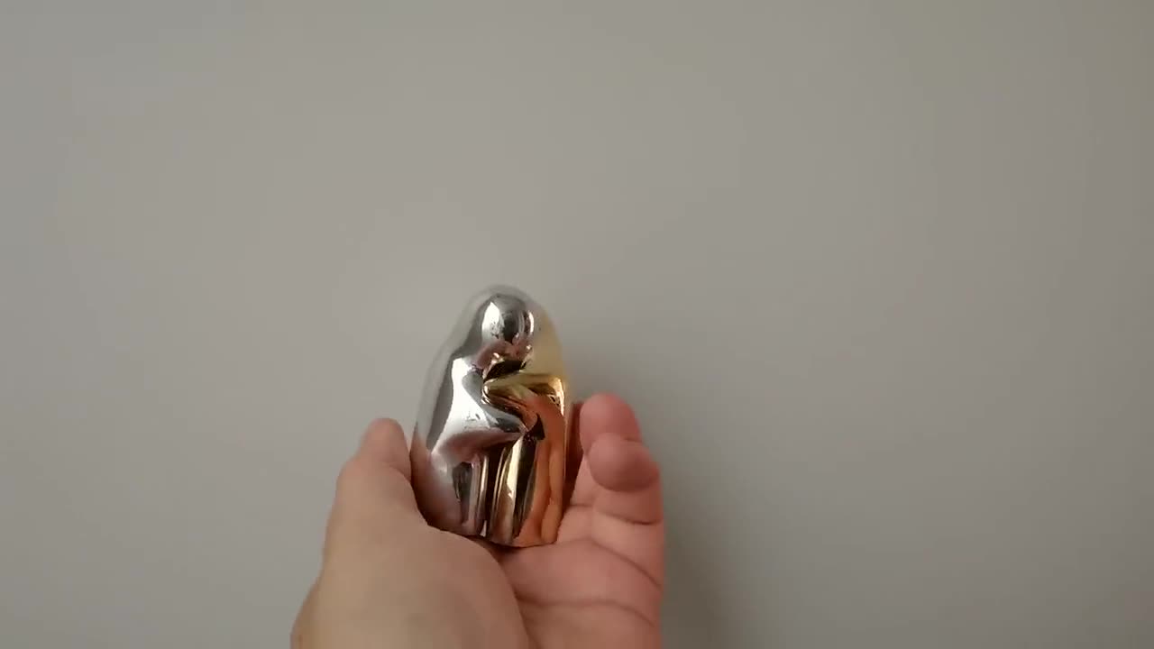 silverl minimalist figures embracing Embracing couple sculpture aluminum figurines embrace 