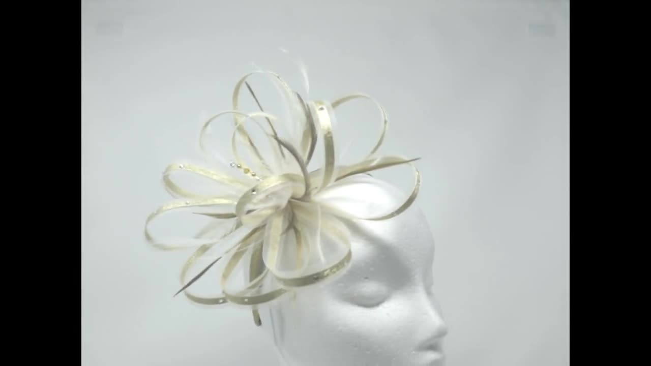 New ivory and gold lurex fascinator optional matching shoe clips available. 