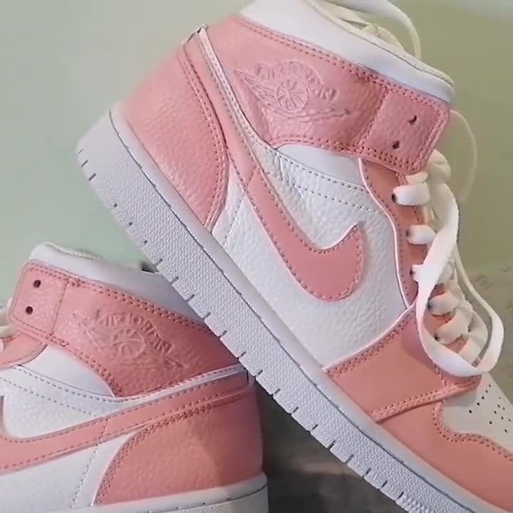 pink high top nike sneakers