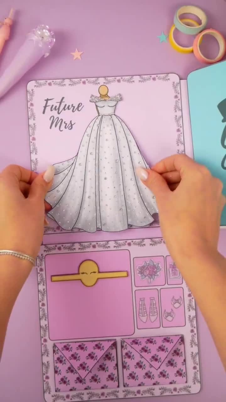 Búp bê giấy có thể in và váy cưới cho trẻ em: Hãy xem hình ảnh các búp bê giấy bạch kim đáng yêu này, được thiết kế để in và cắt ra cho trẻ em. Đặc biệt, bạn có thể tùy ý tạo riêng cho nhân vật yêu thích của mình một chiếc váy cưới xinh xắn. Chắc chắn sẽ là một món quà tuyệt vời cho bé yêu của bạn.
