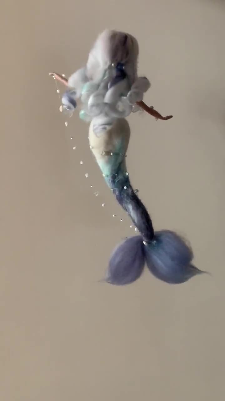 Needle felted mermaid in her own seashell with her baby