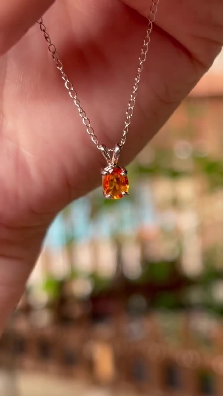 orange sapphire pendant